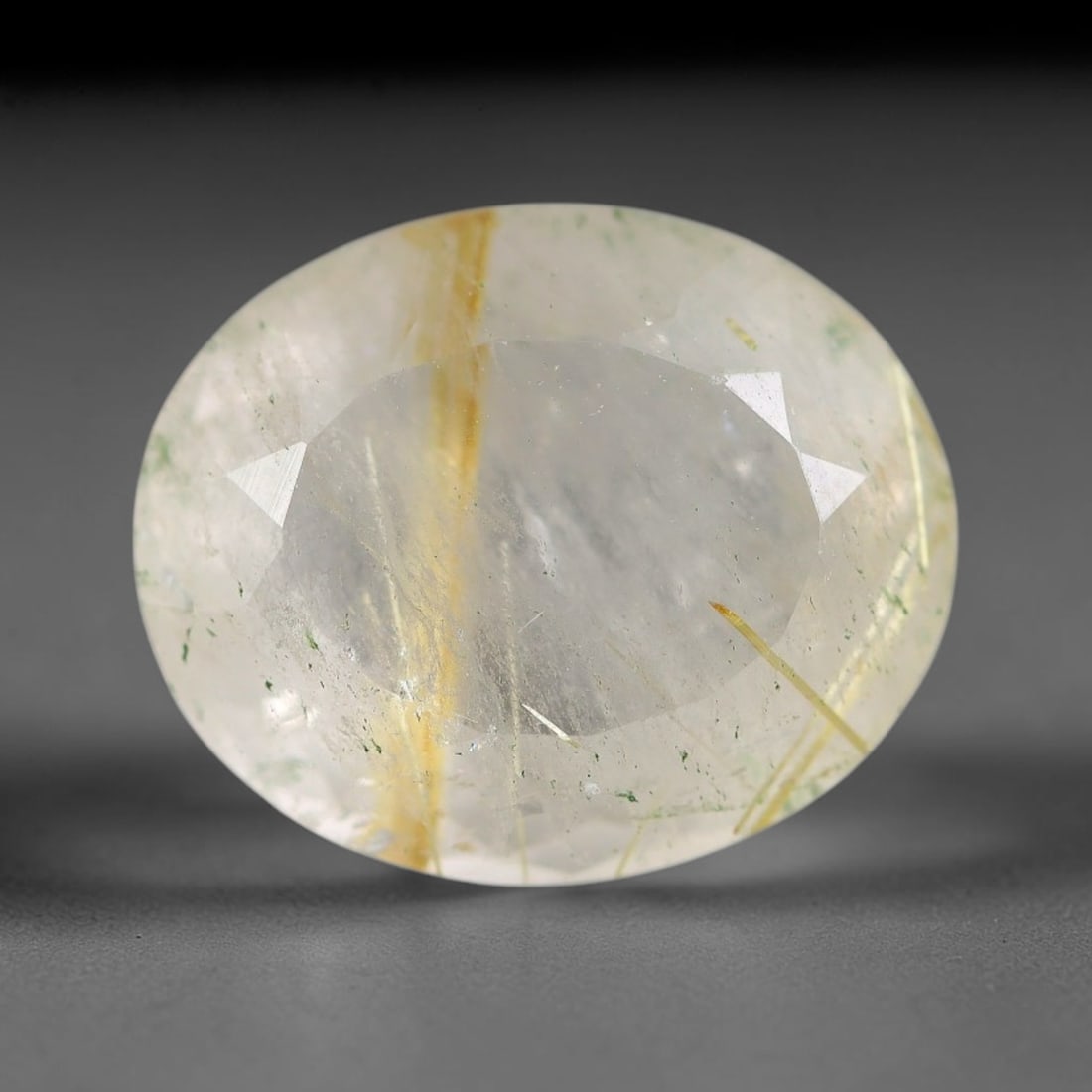 8.68 Carats Natural Brazil Golden Needle Rutile Quartz Loose Gemstone, 88FG: This natural Brazil golden needle rutile quartz facet carries dimension readings of 15x12.4x7.6mm, filled with dense thin copper-gold rutile needle inclusions that stretch horizontally across the tran