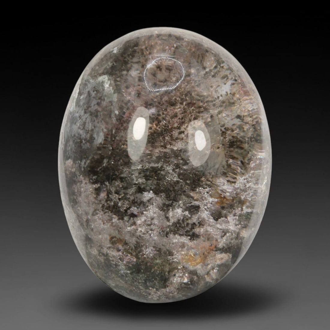 34ct Natural Brazilian Phantom Quartz Oval Cabochon Loose Gemstone, 44BM: This smoothly polished cabochon of natural phantom quartz preserves delicate layered phantom crystal formations enclosed inside transparent quartz host. The domed polished surface offers unobstructed 