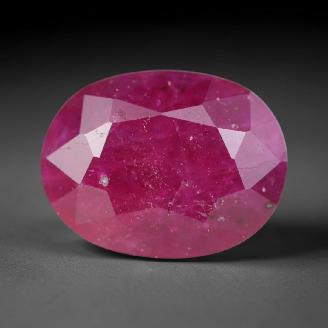 1.21ct Natural Tanzanian Longido Deep Crimson Red Faceted Ruby Loose Gemstone, 79BC: This expertly faceted Longido ruby features a rich deep crimson red body tone with distinct natural linear mineral striations, scattered pale mineral deposits and minor dark mineral flecks visible wit