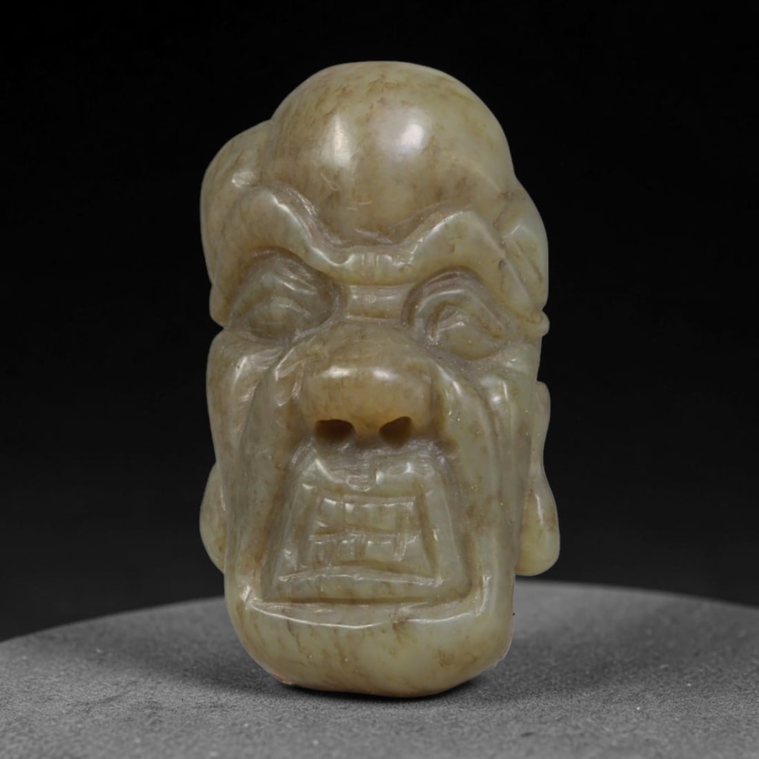 Natural Vintage Chinese Nephrite Jade Arhat Head Face Carved Bead, 15AP: Hand-carved vintage Chinese pendant bead crafted from natural vintage Chinese nephrite jade, measuring 3cm x 1.7cm. This solid cylindrical bead is fully sculpted into a detailed Arhat monk facial bust