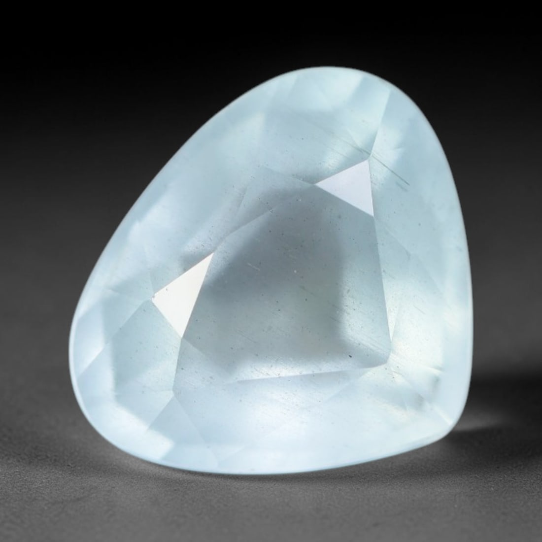 2.70ct Natural Brazilian Soft Sky Blue Faceted Aquamarine Loose Gemstone, 2AS: This expertly faceted aquamarine carries a gentle soft sky blue translucent body with faint fine natural internal mineral markings visible through its polished reflective facets within its 10.3x8.8x5.