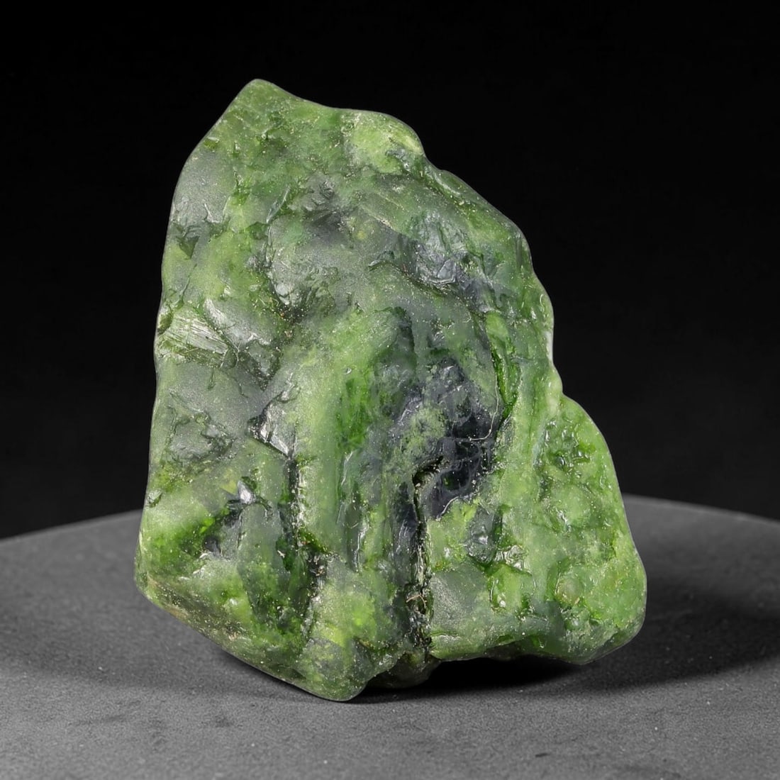 144ct Natural Russian Siberian Deep Forest Green Chrome Diopside Rough, 95AH: This substantial uncut chrome diopside rough features rich saturated forest green color boosted by natural chromium deposits, creating vivid emerald-hued translucency across its textured raw surface, 