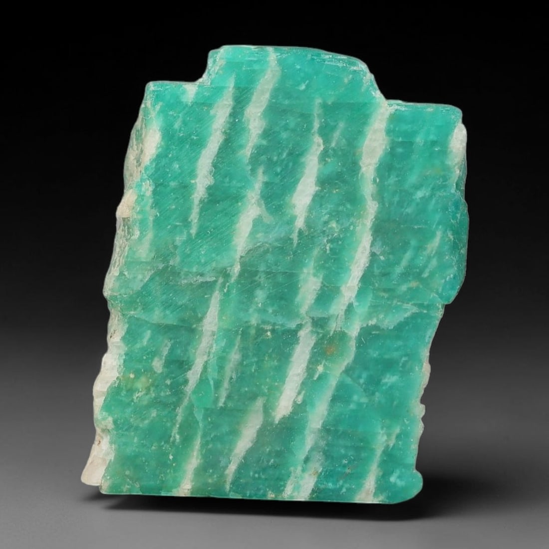 40ct Natural Russian Ural Amazonite Slab Rough, 76EB: This intact amazonite slab features distinct parallel mineral banding running uniformly across its naturally split flat surface within 28x22x6mm slab dimensions, retaining unmodified natural geologica