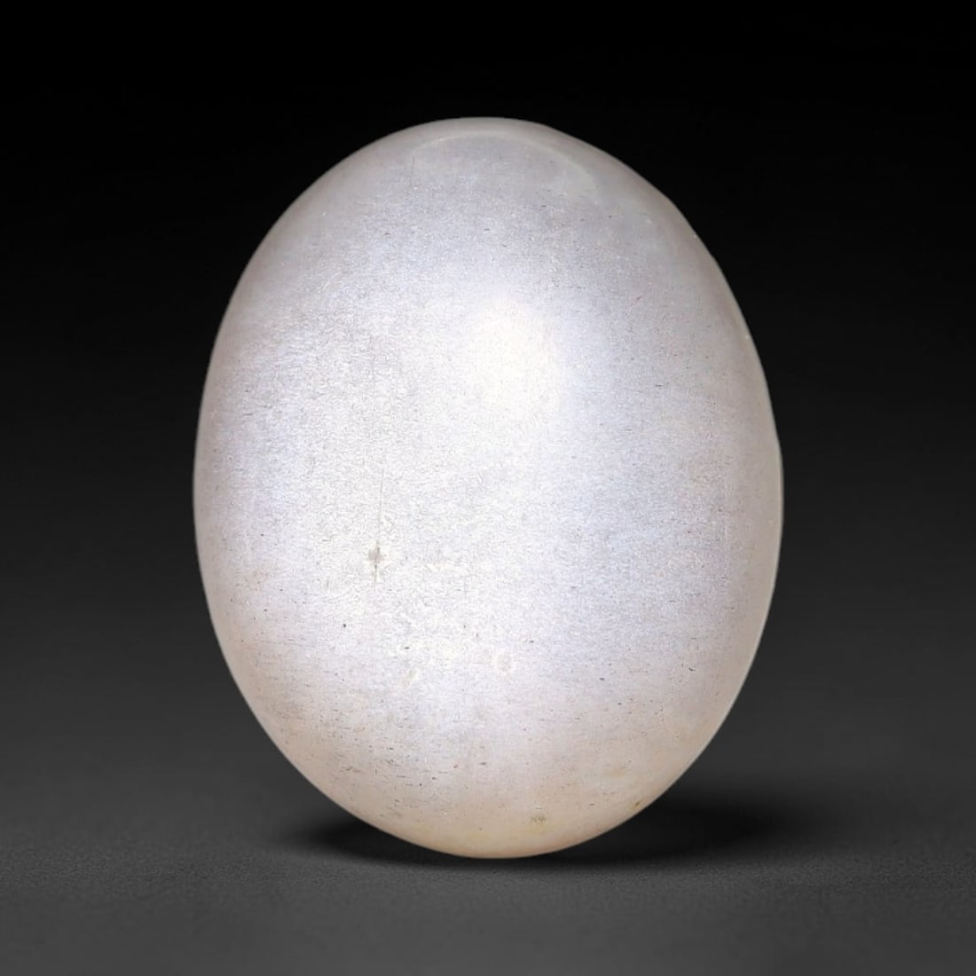 8.55ct Natural Ceylon Grey Moonstone Cabochon Loose Gemstone, 88FX: This natural Ceylon moonstone cabochon carries a soft grey body showcasing classic adularescence. Fine mineral inclusions are visible within the gem. Dimensions measure 14x11x6mm, mined in Sri Lanka, 