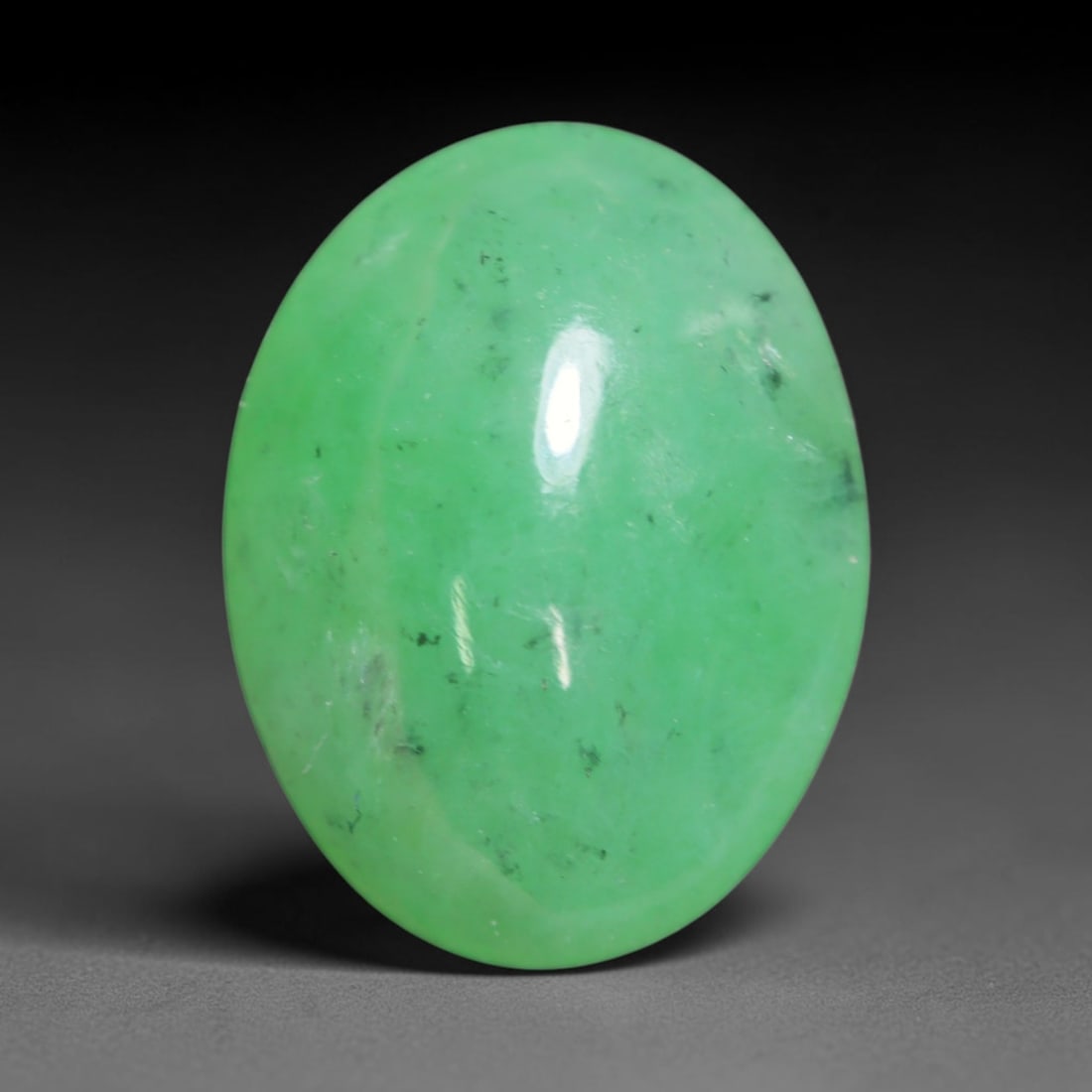 3.73ct Natural Burmese Type A Jadeite Jade Cabochon Loose Gemstone, 55BT: This smoothly polished cabochon is genuine Type A Burmese jadeite jade. It displays soft, even green saturation with gentle natural tonal variation across the polished surface, featuring a fine compac