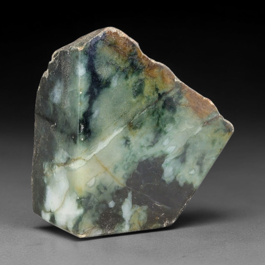 477g Natural Burmese Type A Jadeite Jade Polished Rough Block, 25EZ: This natural Burmese Type A jadeite jade rough block with partial polished surfaces revealing internal mineral characteristics. Dimensions measure 8.5x8cm, sourced from Myanmar, this specimen is ideal