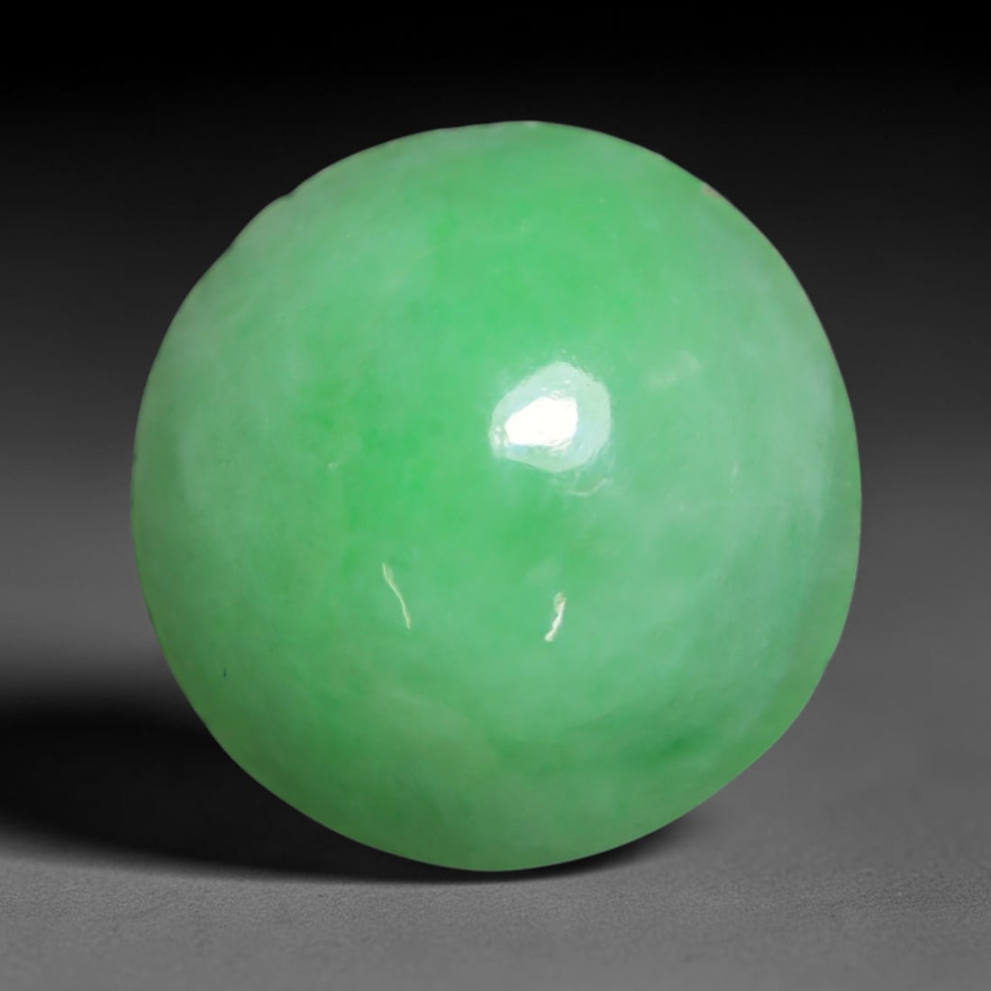 3.76ct Natural Burmese Type A Jadeite Jade Cabochon Loose Gemstone, 58BT: This smoothly polished cabochon is genuine Type A Burmese jadeite jade. It displays soft, even green saturation with gentle natural tonal variation across the polished surface, featuring a fine compac