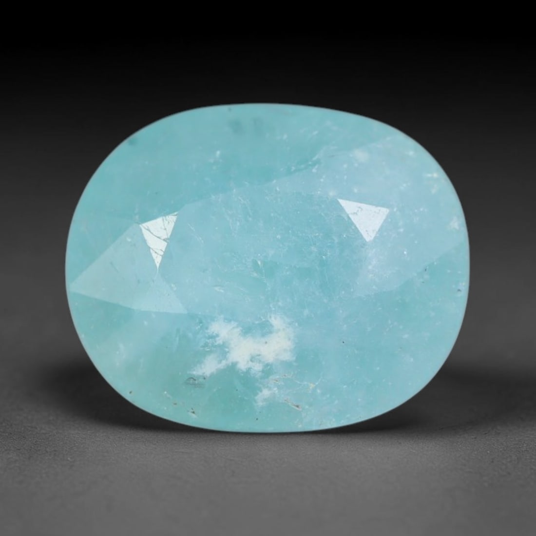 3.29ct Natural Madagascan Faceted Grandidierite Rare Loose Gemstone, 65BD: This expertly faceted finished grandidierite holds soft translucent body tone with fine faint natural internal veining visible beneath precisely cut reflective facets within its 10.5x8.7x5.3mm calibra