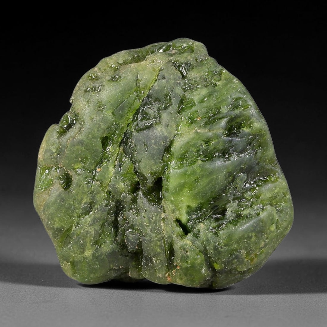 150ct Natural Russian Siberian Deep Forest Green Chrome Diopside Rough, 93AH: This substantial uncut chrome diopside rough features rich saturated forest green color boosted by natural chromium deposits, creating vivid emerald-hued translucency across its textured raw surface, 