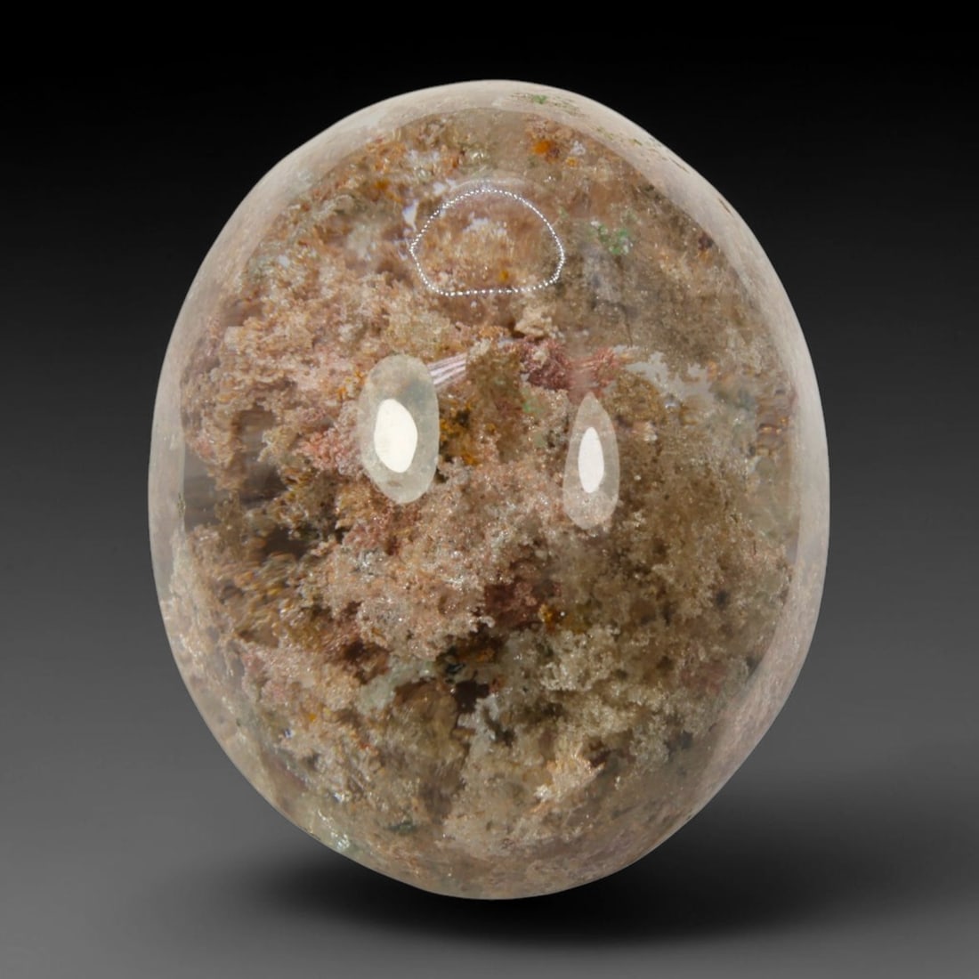 33ct Natural Brazilian Phantom Quartz Oval Cabochon Loose Gemstone, 67BM: This smoothly polished cabochon of natural phantom quartz preserves delicate layered phantom crystal formations enclosed inside transparent quartz host. The domed polished surface offers unobstructed 