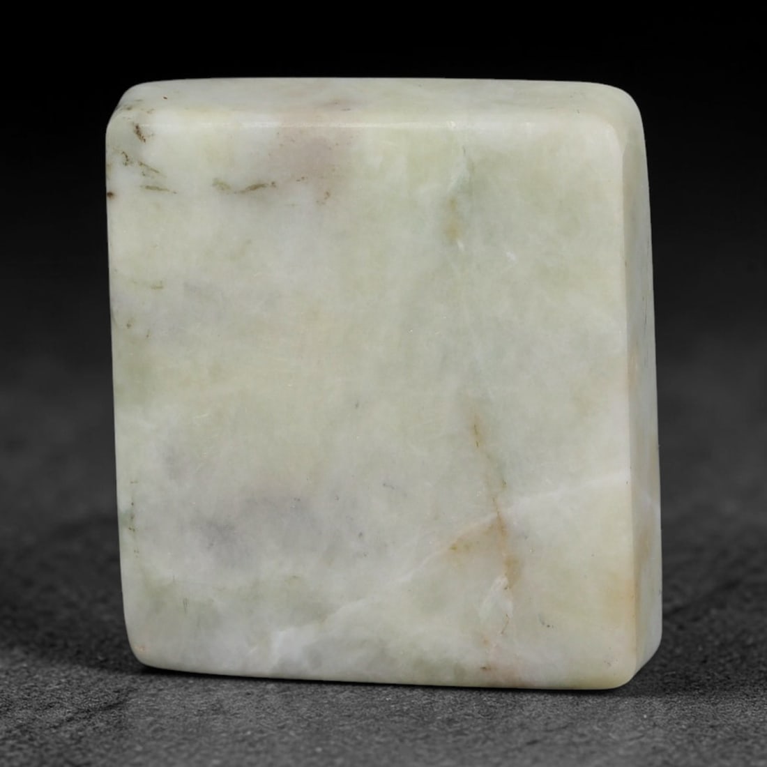 269ct Natural Type A Burmese Jadeite Jade Sliced Rough, 43FD: This specimen is a sliced rough block of natural Type A Burmese jadeite jade. The interior displays natural colour zoning with visible mineral veining and crystalline patterns typical of unprocessed j