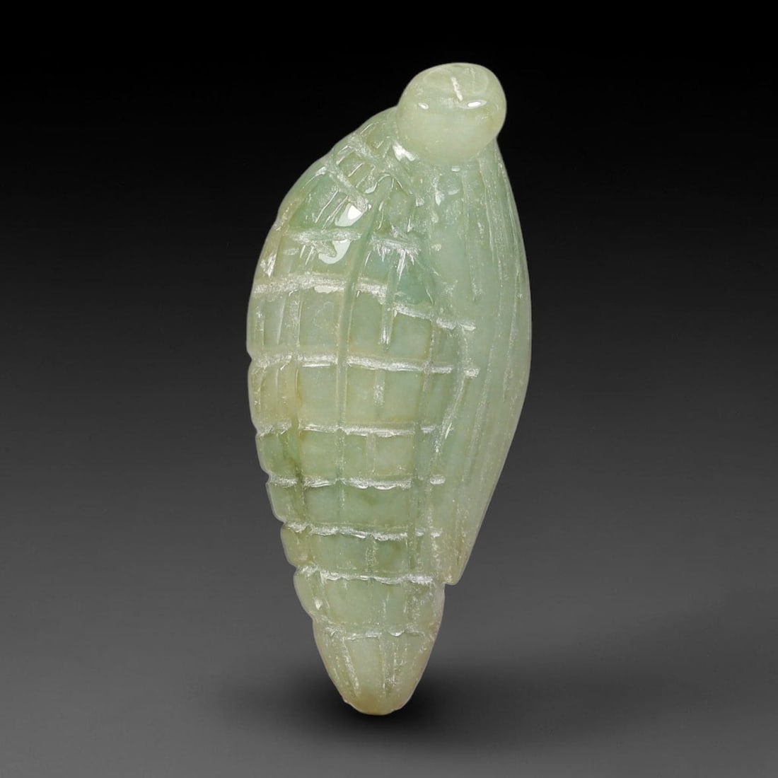 Natural Burmese Type A Jadeite Jade Hand Carved Pendant, 7BS: Artisan hand-carved untreated Burmese Type A jadeite jade pendant measuring 33x14 mm. Carefully sculpted with detailed relief craftsmanship and finished with a smooth glossy polish. Authentic Type A j