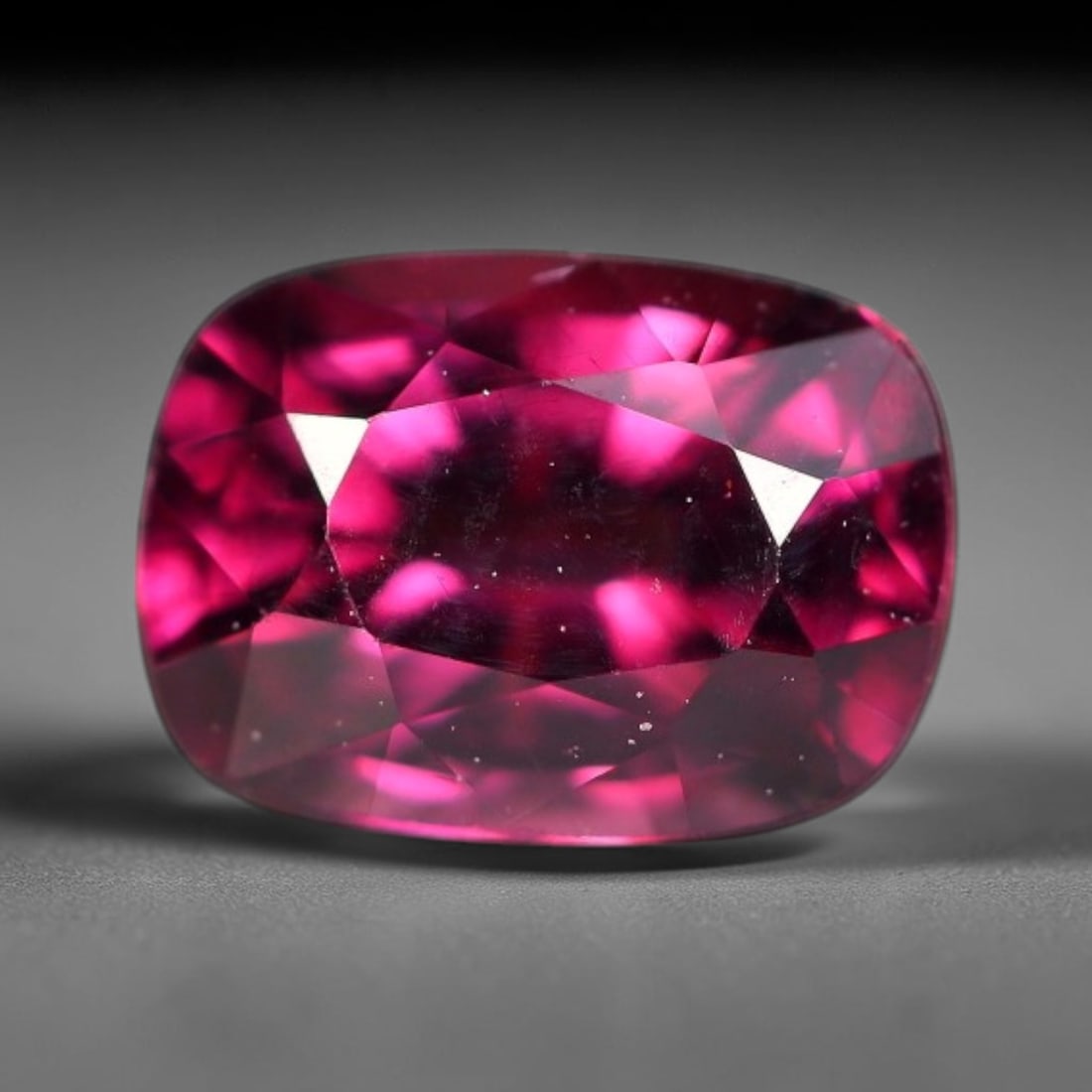 1.05ct Natural Tanzanian Rhodolite Garnet Loose Gemstone, 11BW: This natural rhodolite garnet originates from Tanzania, featuring well finished faceting that enhances light performance within the transparent crystal. Dimensions measure 6.4x4.5x3.7mm, fully polishe