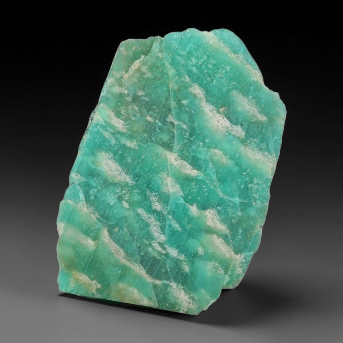65ct Natural Russian Ural Amazonite Slab Rough, 96EB: This intact amazonite slab features distinct parallel mineral banding running uniformly across its naturally split flat surface within 30x23x14mm slab dimensions, retaining unmodified natural geologic