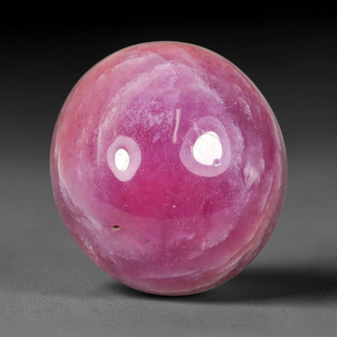 14.95 Carats Natural Mozambique Vivid Pink Red Ruby Loose Gemstone, 87FG: This polished Mozambique ruby cabochon measures 14.8x13.8x7.3mm, featuring striking natural swirling white mineral banding layered across a rich saturated pink red base that creates a unique organic a