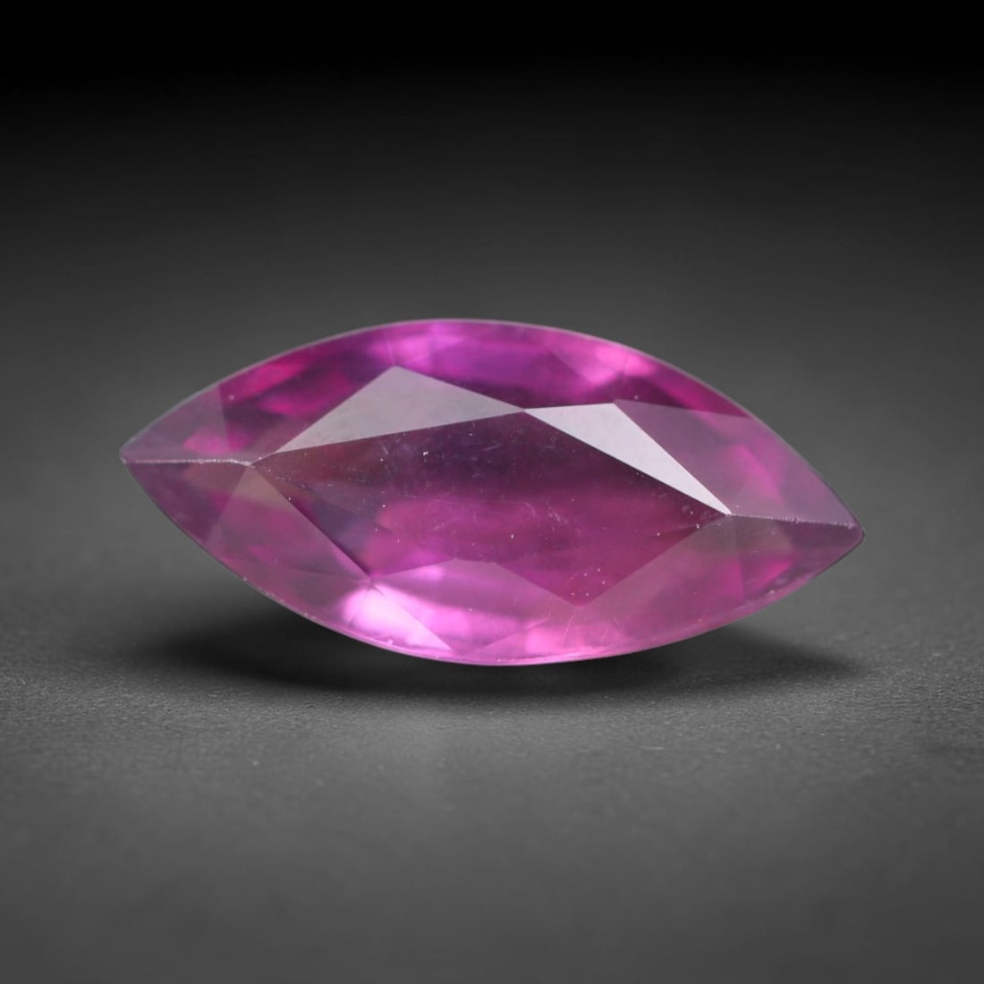 1.60ct Natural Tanzanian Rhodolite Grape Garnet Faceted Loose Gemstone, 81BA: This expertly faceted grape garnet, a scarce saturated purple-magenta rhodolite variant, features transparent crystal structure dotted with faint microscopic mineral specks within its precisely cut re