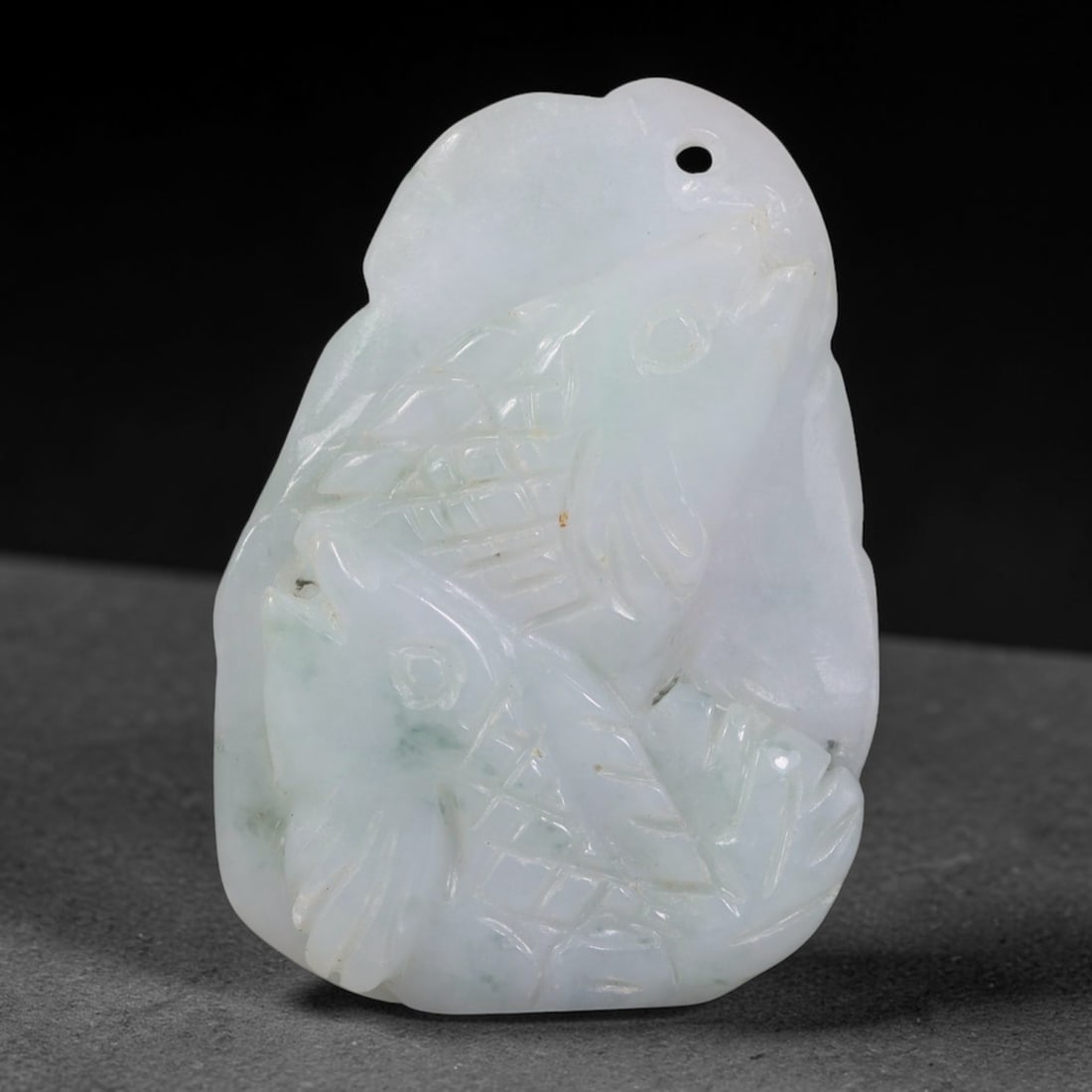 Natural Vintage Burmese Type A Jadeite Jade Twin Koi Fish Relief Pendant, 41AA: Hand-carved vintage auspicious pendant crafted from untreated natural Burmese Type A jadeite jade, measuring 4cm x 2.8cm. This freeform irregular jade plaque features deeply incised relief carving of 