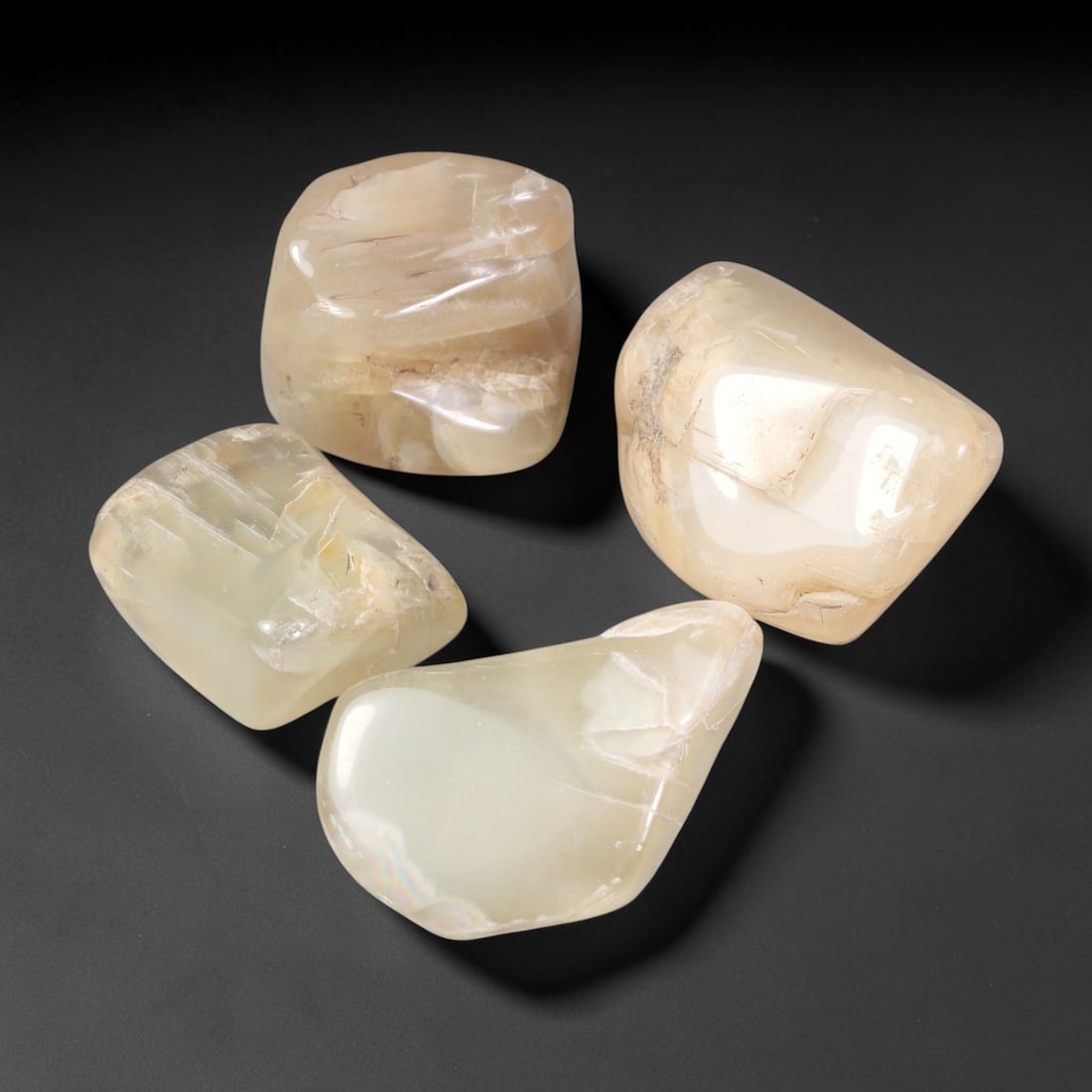 300ct Natural Ceylon Moonstone Tumbled Rough Parcel Lot, 6EW: This parcel features naturally tumbled Ceylon moonstone rough displaying soft creamy pale-hued translucent bodies with natural internal fractures and textural layering. Smooth water-worn surfaces show