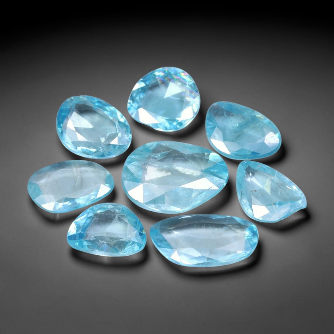 14.14ct Natural Cambodian Rose Cut Blue Zircon Loose Gemstone Parcel Lot, 15EV: This attractive parcel of rose-cut blue zircon features cool aquatic blue tones paired with flat-backed rose cut faceting, creating soft diffused sparkle and dreamy translucent visual effect. Varied f