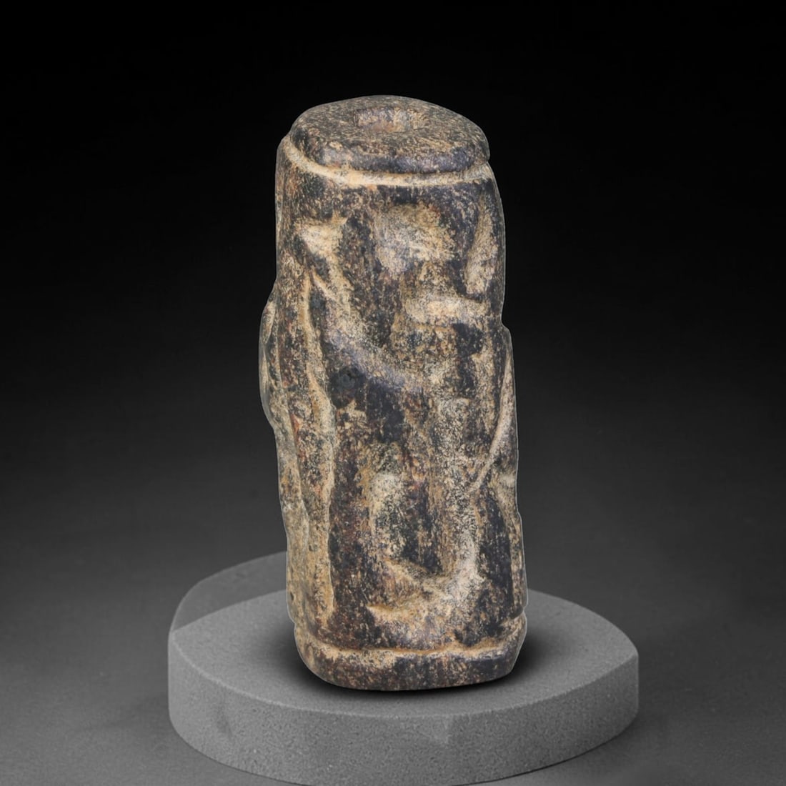 Ancient Sasanian Persian Carved Stone Cylinder Amulet (224-651 CE), 50EF: This antique carved stone cylinder amulet originates from the Sasanian Persian Empire, famed for zoomorphic talismanic carvings crafted for personal protection across late antique Western Asia. The da