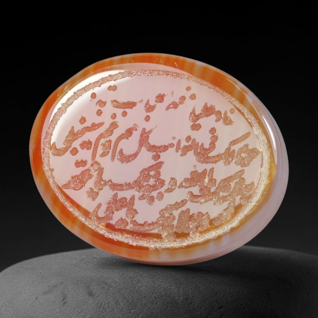 Vintage Mid-Century Carnelian Agate Islamic Calligraphic Intaglio Seal Cabochon Talisman, 38EM: This vintage mid-century natural carnelian agate intaglio seal cabochon draws inspiration from historic Islamic lapidary traditions, crafted as a wearable talisman and seal blank for jewelry setting. 