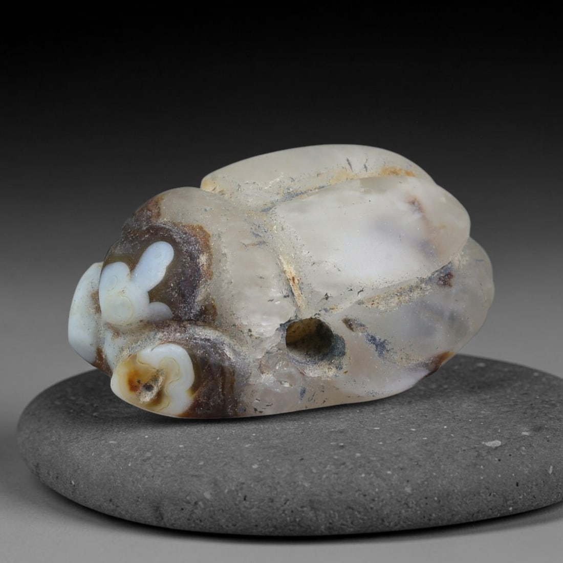 Ancient Pharaonic Egyptian Agate Scarab Amulet Bead (3100 BCE-30 CE), 38FV: This antique scarab amulet bead is carved from natural agate, originating from Pharaonic Egyptian culture. Scarabs were sacred protective talismans closely linked to rebirth and eternal life within an