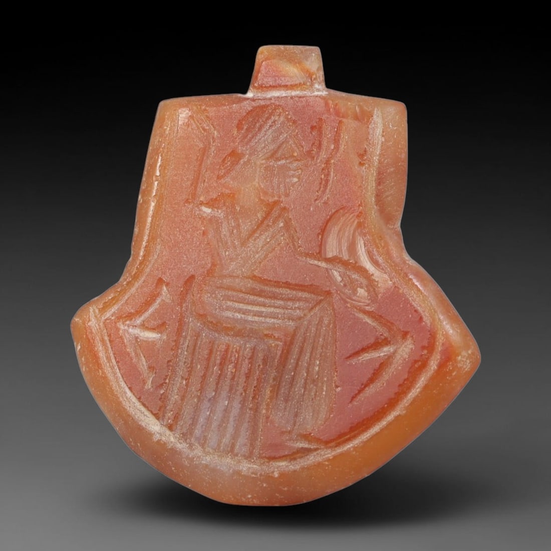 Vintage Natural Carnelian Agate Revival Indo-Persian Glyptic Figural Talisman Amulet Plaque, 71FK: This vintage talisman pendant plaque is skillfully carved from natural banded carnelian agate, crafted in a style referencing ancient Indo-Persian glyptic art traditions. The face bears detailed relie