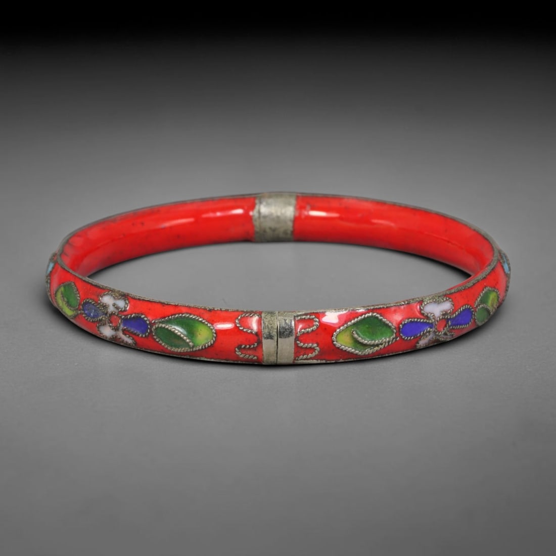 Vintage Chinese Cloisonne Bangle - Red Floral Enamel Bracelet, 74FD: Constructed with silvered metal base finished in traditional Chinese cloisonne wire filigree work, the bangle features a vibrant scarlet enamel ground inlaid with segmented floral motifs in green, dee