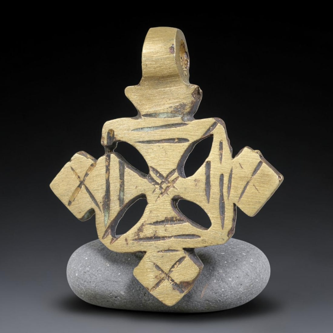 Vintage Ethiopian Copper Alloy Cross Pendant, 28EJ: Crafted from copper alloy, this traditional Ethiopian cross pendant features integrated suspension loop for wear. Shows authentic surface patina consistent with vintage origin. Dimensions: 3.7x3.3cm. 