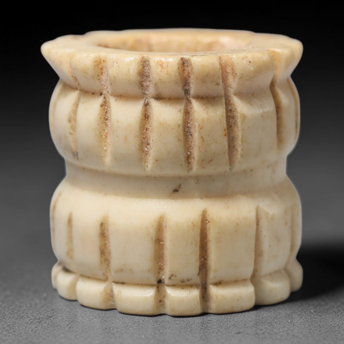 Antique Sino-Siberian Steppe Nomadic Craft Stag Antler Carved Cylinder Bead (Post 1850s), 86FV: Single bead carved from natural stag antler, originating from Sino-Siberian Steppe Nomadic craft traditions, post 1850s. Measuring 2cm, the piece features detailed surface carving and carries warm nat