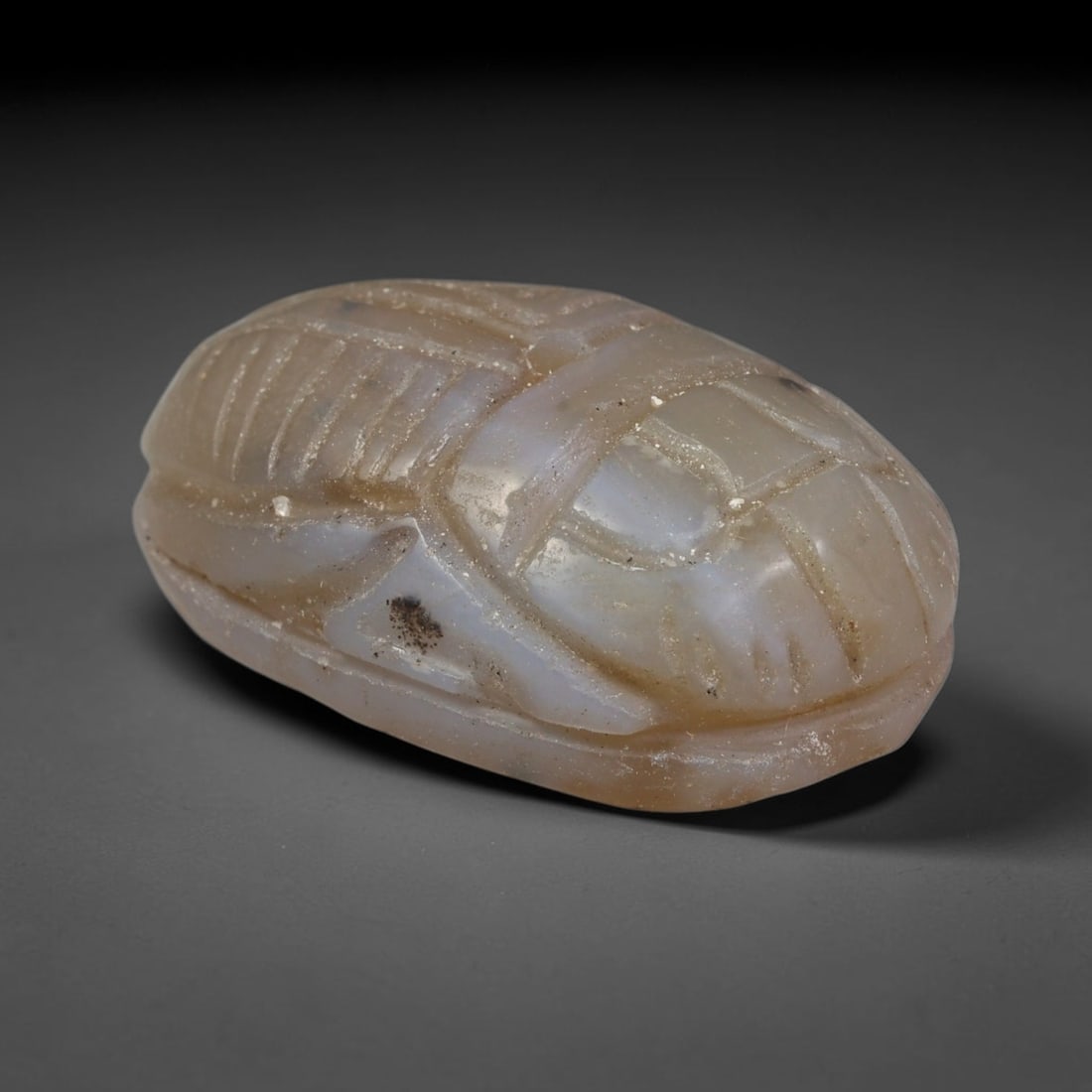 Ancient Predynastic & Pharaonic Egyptian Chalcedony Scarab Amulet Bead (4000 BCE-30 CE), 40EC: This antique chalcedony scarab amulet bead originates from Predynastic & Pharaonic Egyptian Civilization, iconic funerary and protective talisman craft central to ancient Egyptian belief systems. The 