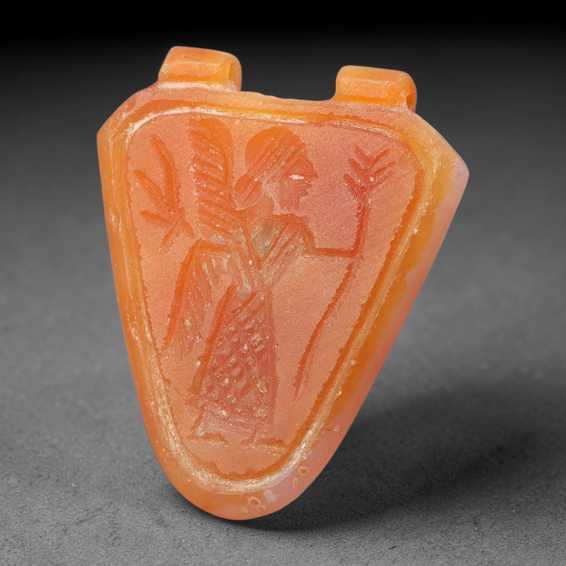 Vintage Natural Carnelian Agate Revival Indo-Persian Glyptic Figural Talisman Amulet Plaque, 95FK: This vintage talisman pendant plaque is skillfully carved from natural banded carnelian agate, crafted in a style referencing ancient Indo-Persian glyptic art traditions. The face bears detailed relie