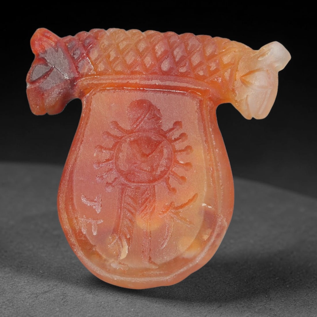 Vintage Natural Carnelian Agate Revival Indo-Persian Glyptic Figural Talisman Amulet Plaque, 43FL: This vintage talisman pendant plaque is skillfully carved from natural banded carnelian agate, crafted in a style referencing ancient Indo-Persian glyptic art traditions. The face bears detailed relie