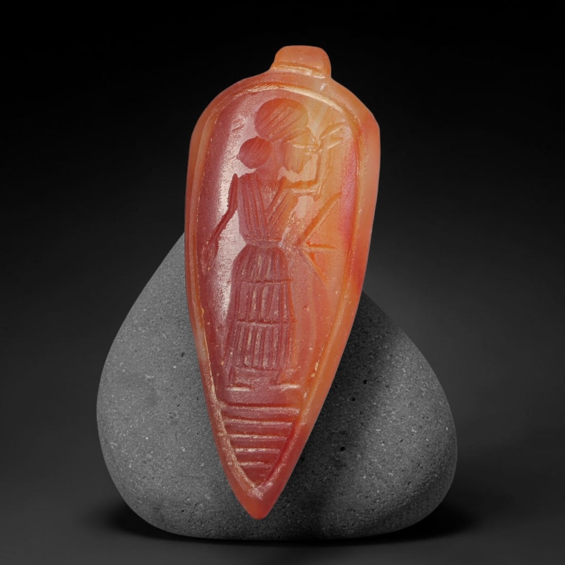 Vintage Natural Carnelian Agate Revival Indo-Persian Glyptic Figural Talisman Amulet Plaque, 35FL: This vintage talisman pendant plaque is skillfully carved from natural banded carnelian agate, crafted in a style referencing ancient Indo-Persian glyptic art traditions. The face bears detailed relie