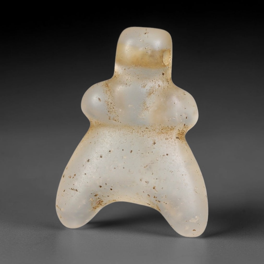 Ancient Medieval Coptic Christian Egyptian Culture Rock Crystal Amulet (300-1000 CE), 48EG: This antique rock crystal amulet originates from Coptic Christian Egyptian Culture, a region with a long-standing tradition of crafting translucent hardstone talismans for devotional and funerary use.