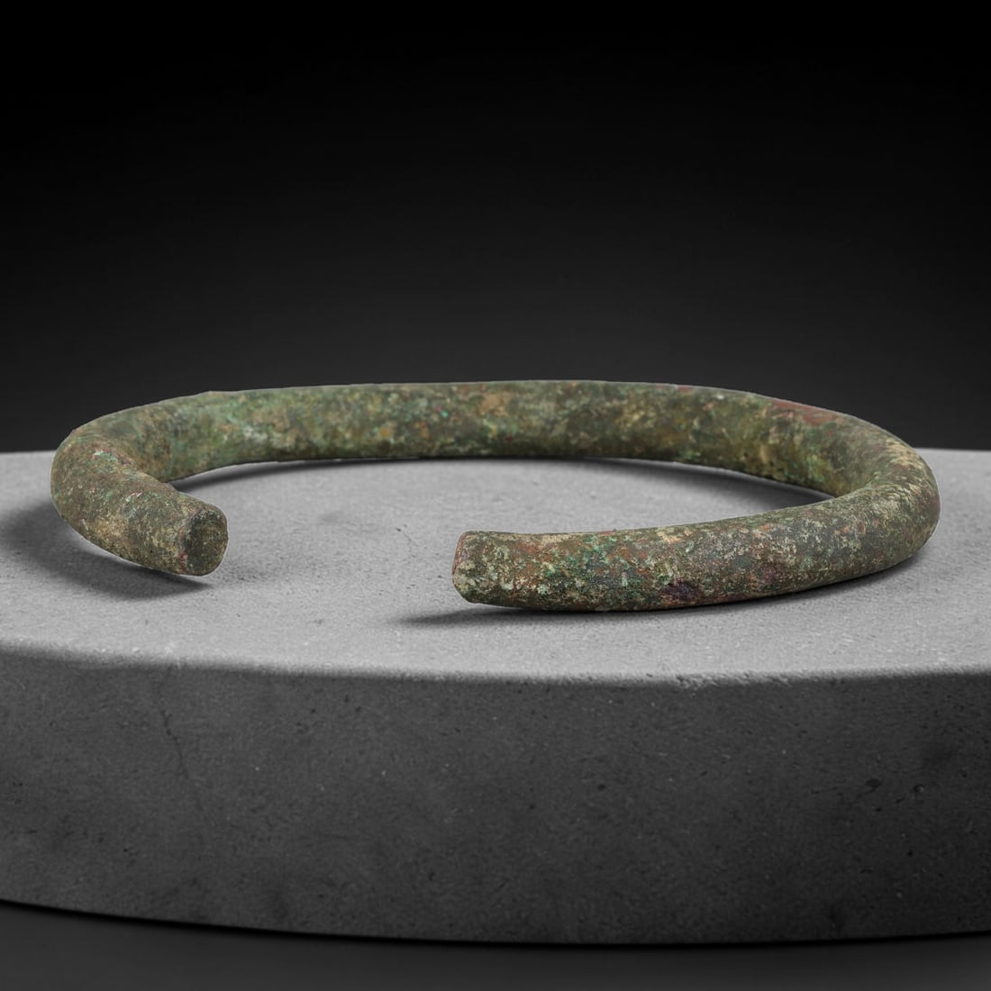 Ancient Roman Solid Bronze Bangle Bracelet, 96AC: Antique wearable circlet hand-forged from solid bronze alloy metal, originating from classical Roman provincial craft and personal adornment traditions across the ancient Mediterranean sphere. Bronze 