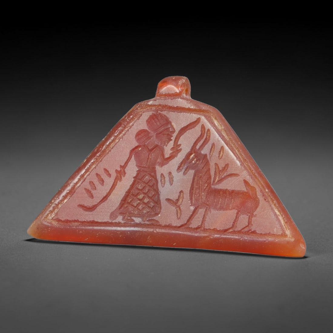 Vintage Natural Carnelian Agate Revival Indo-Persian Glyptic Figural Talisman Amulet Plaque, 66FK: This vintage talisman pendant plaque is skillfully carved from natural banded carnelian agate, crafted in a style referencing ancient Indo-Persian glyptic art traditions. The face bears detailed relie