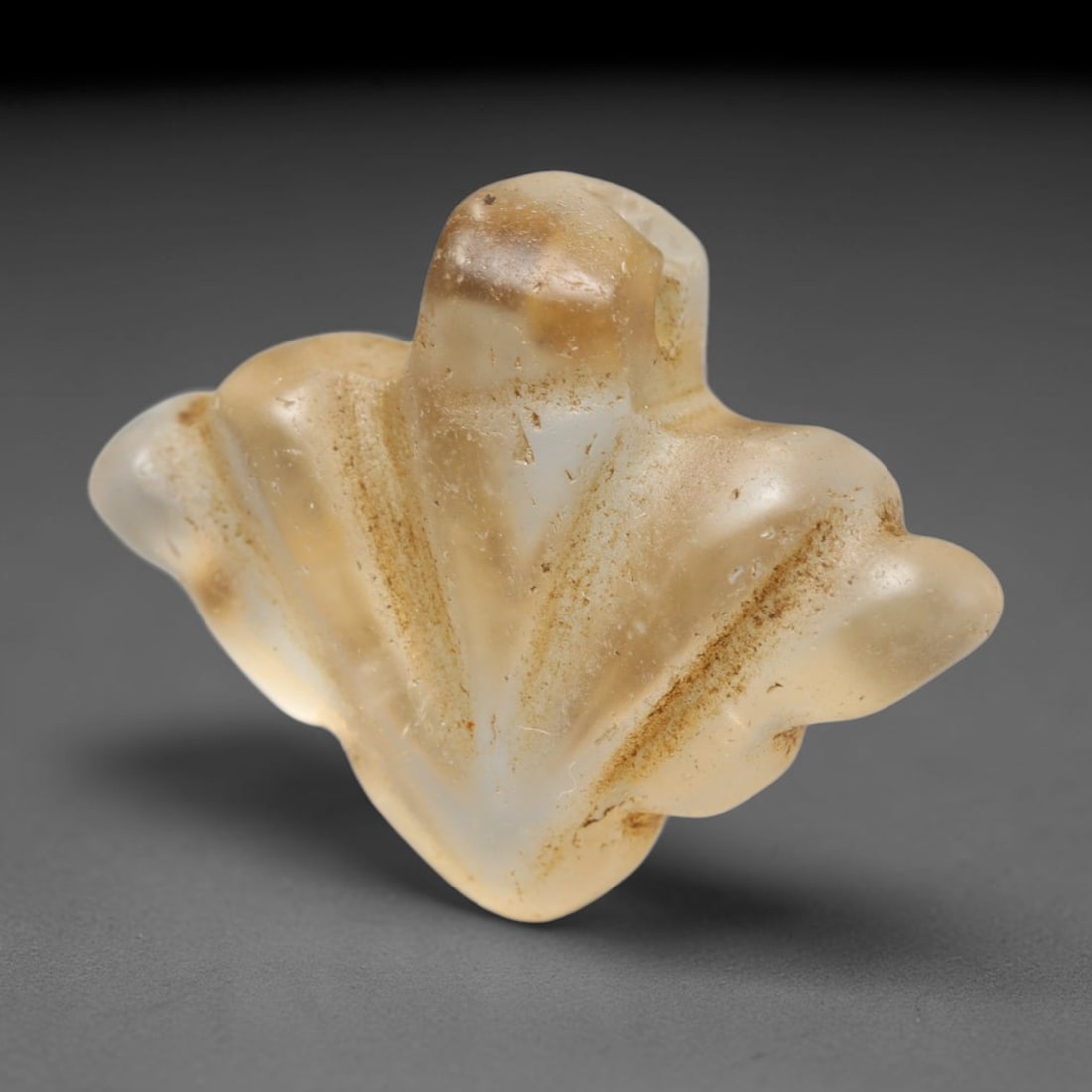 Ancient Medieval Coptic Christian Egyptian Culture Rock Crystal Amulet (300-1000 CE), 22FY: This antique rock crystal amulet originates from Coptic Christian Egyptian Culture, a region with a long-standing tradition of crafting translucent hardstone talismans for devotional and funerary use.
