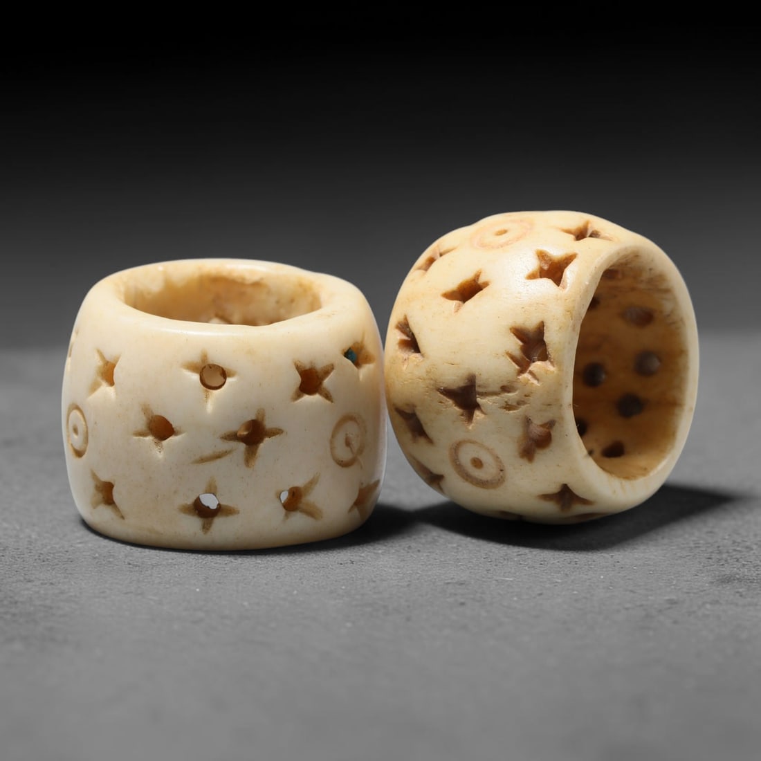 Antique Sino-Siberian Steppe Nomadic Craft Stag Antler Carved Bead Pair (Post 1850s), 27FV: Pair of beads skillfully carved from natural stag antler, originating from Sino-Siberian Steppe Nomadic craft traditions, produced post 1850s. The antler material holds attractive natural aged patina,