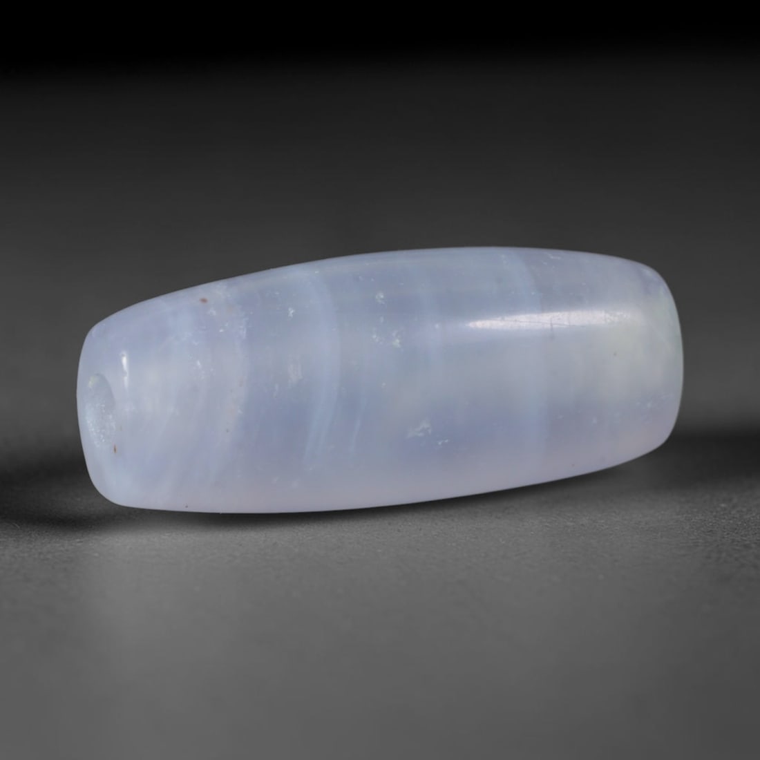 Ancient Early Byzantine Civilization Banded Agate Barrel Bead (330-650 CE), 34AD: This antique banded agate barrel bead originates from Early Byzantine Civilization, Eastern Mediterranean artisans crafting agate talismans and devotional prayer beads circulated across Mediterranean 