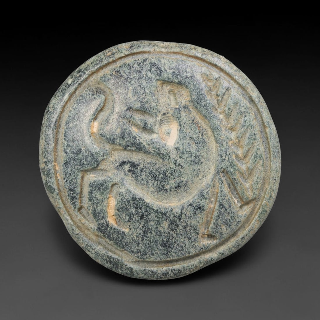 Ancient Sasanian Persian Double Convex Intaglio Bead (224-651 CE), 80ED: This antique double convex intaglio bead originates from the Sasanian Persian Empire, crafted as a dual-sided wearable seal and protective talisman characteristic of late antique Western Asian craft t