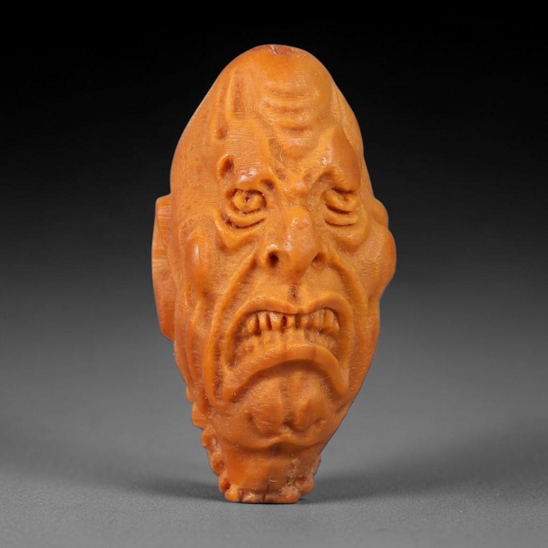 A Chinese Carved Natural Olive Nut Drilled Art Bead, 30BZ: Traditional craft bead carved from solid natural olive nut core, representing a classic miniature Chinese micro-carving folk art piece with a pre-drilled suspension bore integrated for easy threading 