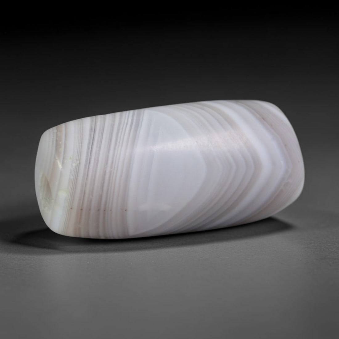 Ancient Bactrian & Greco-Bactrian Cultures Banded Agate Barrel Bead (250 BCE-200 CE), 99AC: This antique banded agate barrel bead originates from the Bactrian & Greco-Bactrian Cultures, Central Asian fusion societies blending Greek and Persian bead-making traditions to craft refined banded c
