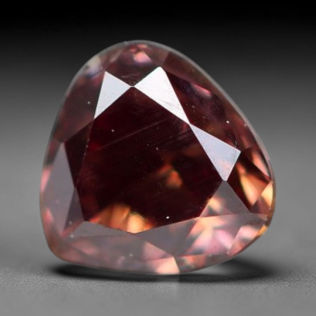 0.17ct Natural Fancy Pinkish Purple Diamond Loose Gemstone, 15BG: This polished natural diamond displays rich pinkish-purple body saturation, with subtle fine microscopic mineral specks distributed within its crystal interior, measured at calibrated dimensions of 3.