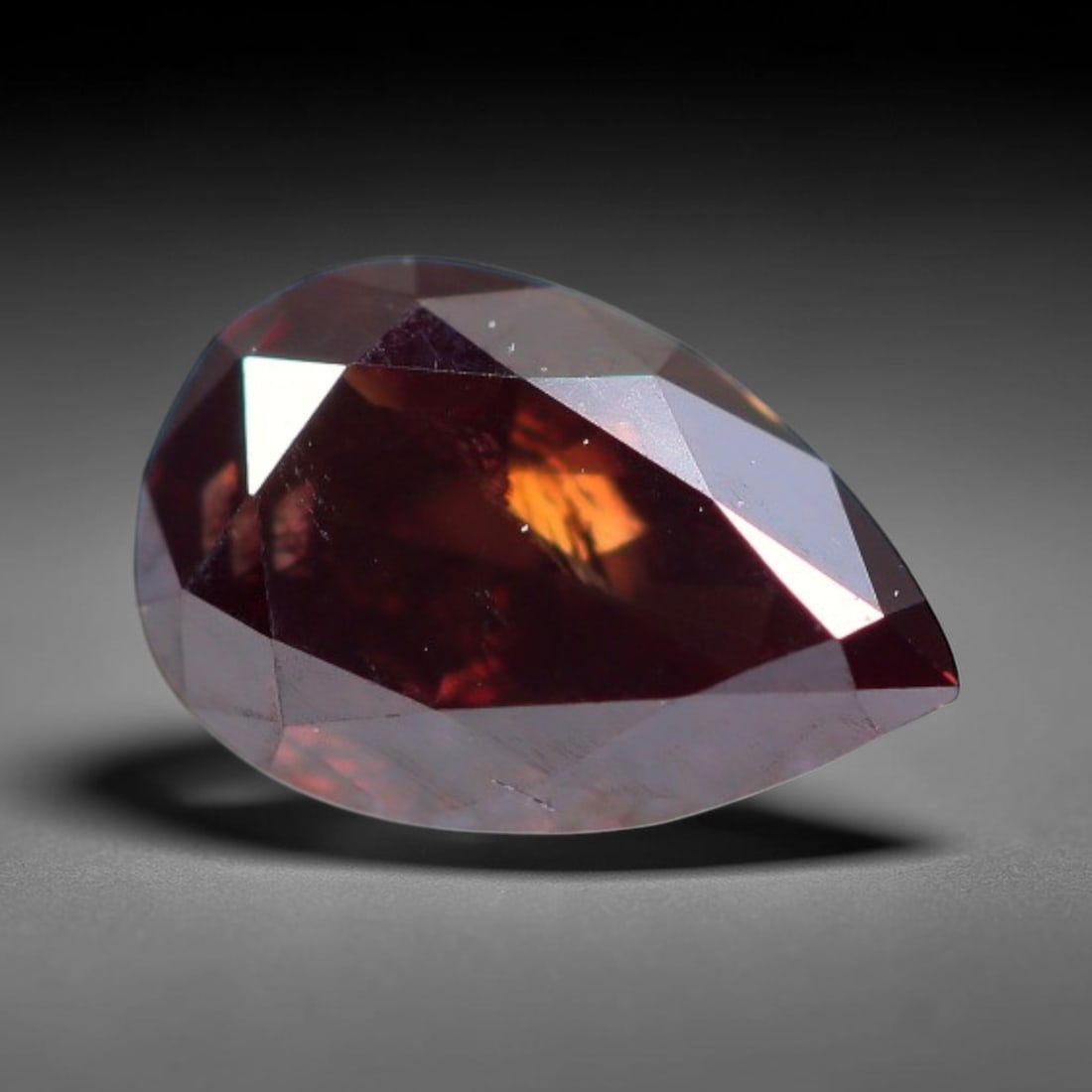 0.22ct Natural Fancy Pinkish Purple Diamond Loose Gemstone, 19BH: This polished natural diamond displays rich pinkish-purple body saturation, with subtle fine microscopic mineral specks distributed within its crystal interior, measured at calibrated dimensions of 4.