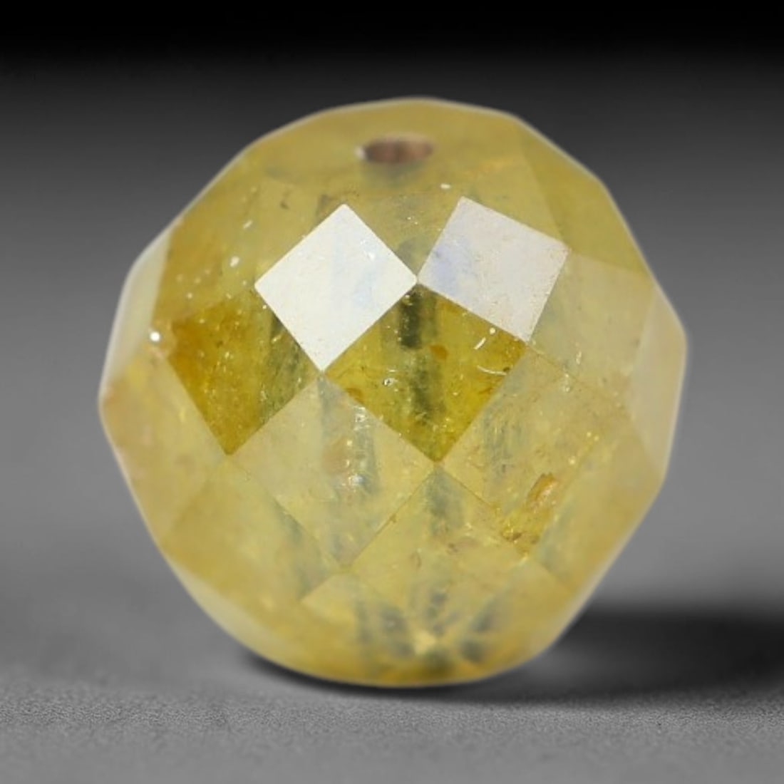 0.55ct Natural Fancy Faceted Diamond Bead Loose Gemstone, 88BE: This fully polished natural fancy diamond bead features warm pale yellowish crystalline body tone with abundant native mineral inclusions captured within its structure, measured at calibrated dimensio