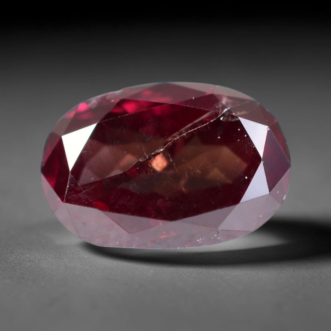 0.43ct Natural Fancy Pinkish Purple Diamond Loose Gemstone, 11BH: This polished natural diamond displays rich pinkish-purple body saturation, with subtle fine microscopic mineral specks distributed within its crystal interior, measured at calibrated dimensions of 5.