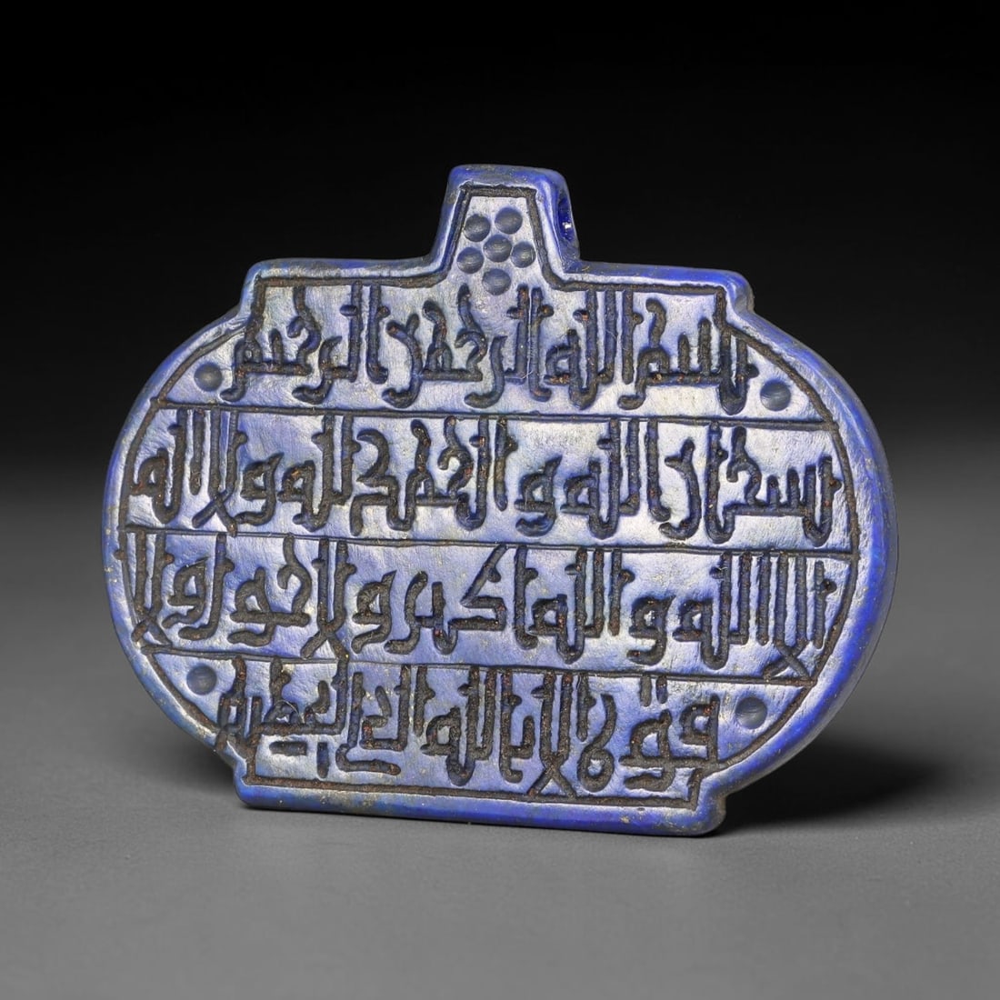 Ancient Medieval Mughal Islamic Lapis Lazuli Calligraphic Script Talisman Plaque 1526-1857 CE, 71ES: This antique carved lapis lazuli talisman plaque originates from Mughal artistic traditions of the Indian subcontinent, treasured mineral amulets crafted for devotional use, spiritual protection and n