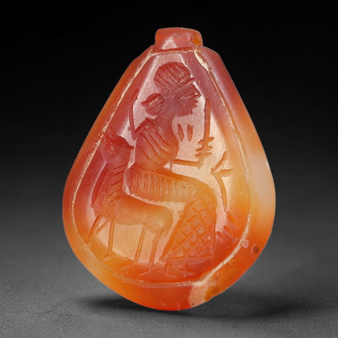 Vintage Natural Carnelian Agate Revival Indo-Persian Glyptic Figural Talisman Amulet Plaque, 96FK: This vintage talisman pendant plaque is skillfully carved from natural banded carnelian agate, crafted in a style referencing ancient Indo-Persian glyptic art traditions. The face bears detailed relie