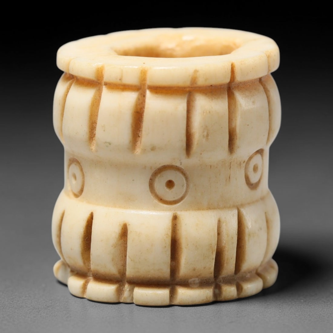 Antique Sino-Siberian Steppe Nomadic Craft Stag Antler Carved Cylinder Bead (Post 1850s), 80FV: Single bead carved from natural stag antler, originating from Sino-Siberian Steppe Nomadic craft traditions, post 1850s. Measuring 2cm, the piece features detailed surface carving and carries warm nat